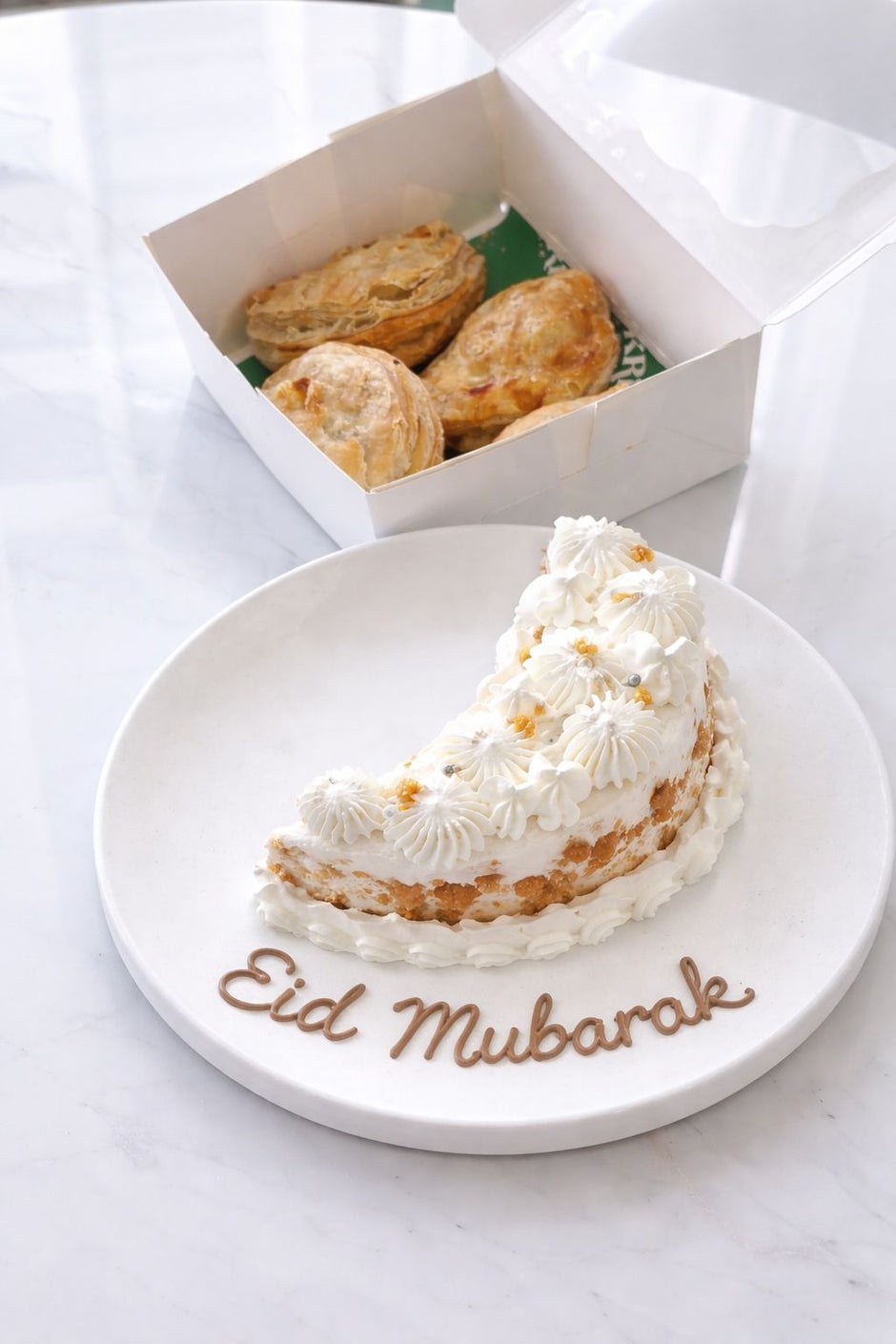 Assorted puff pastry box featuring moon-shaped butterscotch pastries in Dubai | Bae-kri