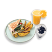 Toasted chicken guacamole wrap combo cut in half showing creamy avocado filling next to a premium café drink at BAEKRI Dubai