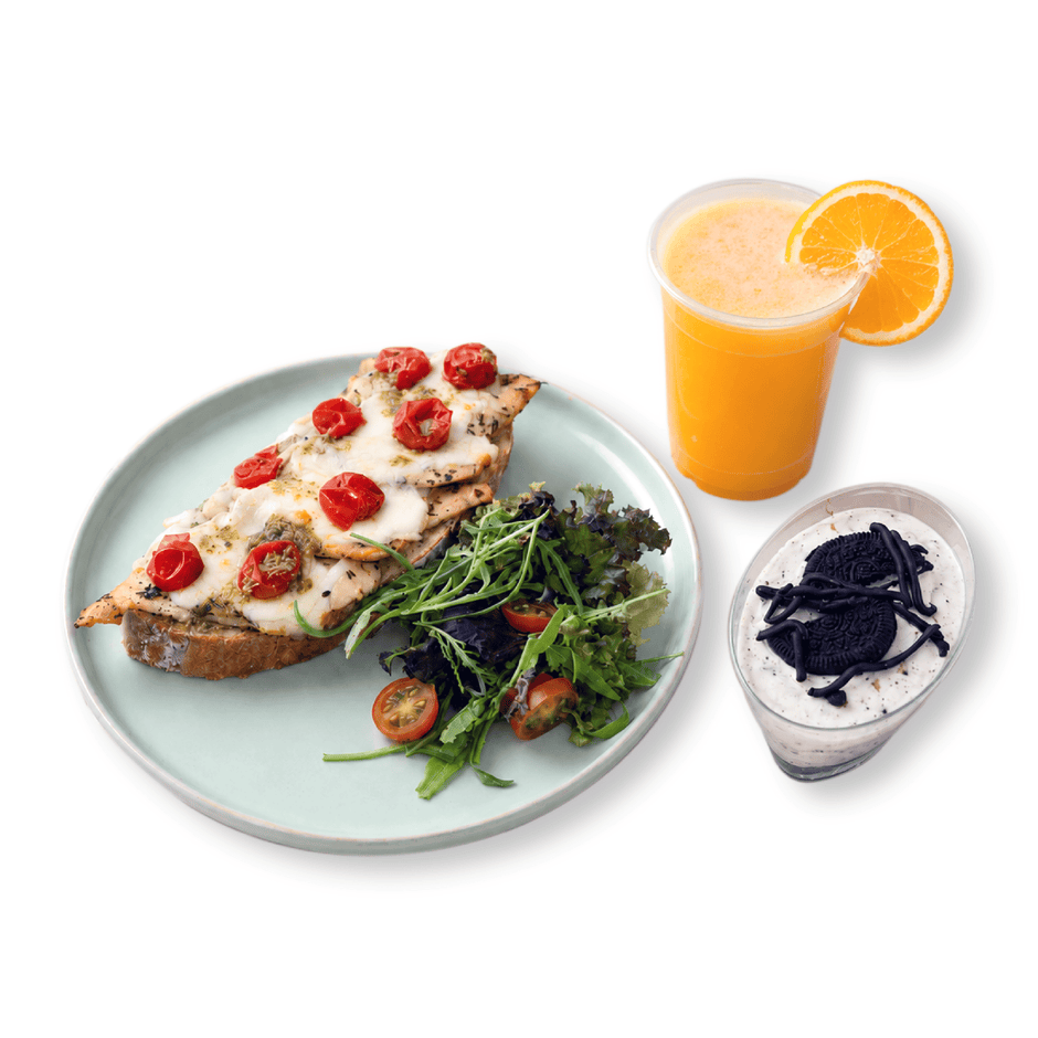 Toasted artisanal chicken pesto mozzarella sandwich combo served alongside a premium hot cafe beverage at BAEKRI Dubai