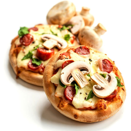 Two small round pizzas topped with melted cheese, sliced mushrooms, red pepperoni, and green herbs, photographed on a clean white background with a few mushrooms standing behind them.