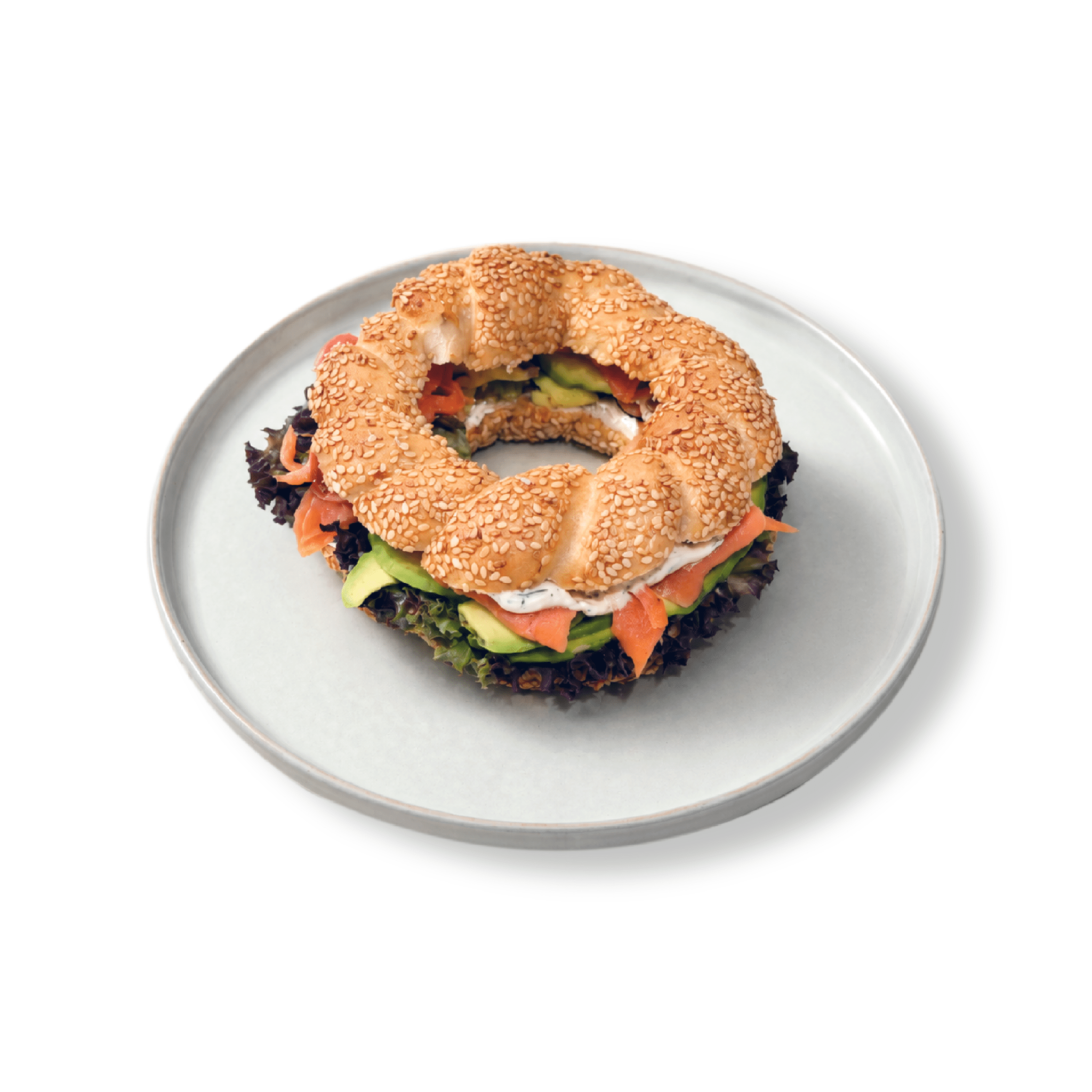 Toasted golden sesame crusted simit sandwich filled with premium smoked salmon ribbons cream cheese capers and dill