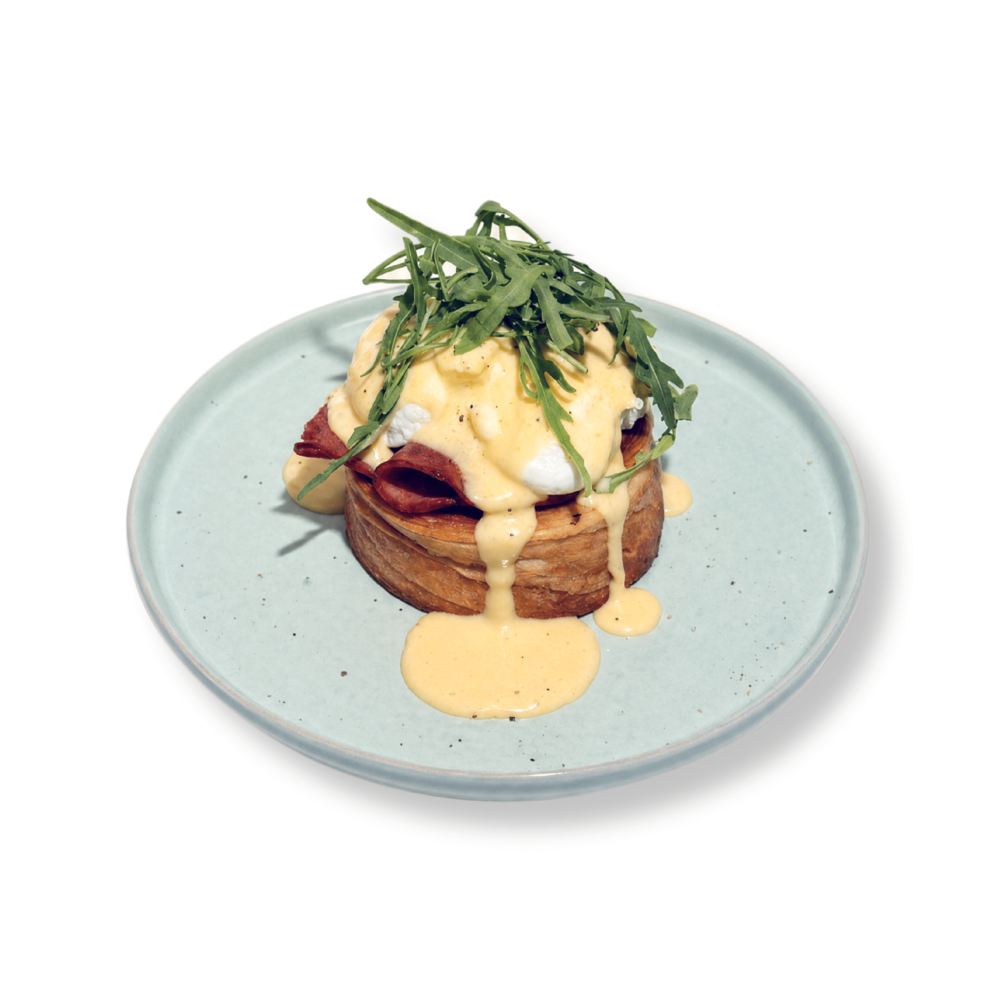Gourmet Smoked Turkey Roll Eggs Benedict with perfectly poached eggs and rich velvety hollandaise sauce served